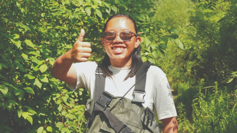 A thumbs up from Linda Hang while working in Valley Creek in Port Washington.